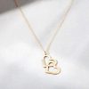 collier avec cœur gravé