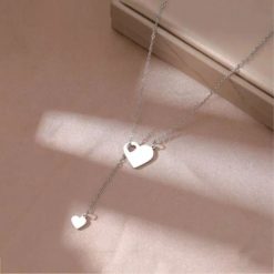 collier avec double cœur