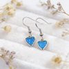 boucles d'oreilles avec cœur bleu