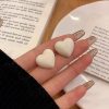 boucles d’oreilles avec cœur en blanc