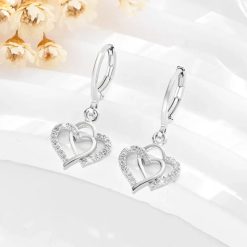 boucles d'oreilles avec cœur entrelacé