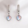 boucles d'oreilles avec cœur pierre