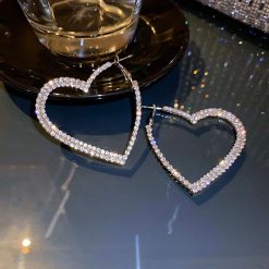 boucles d’oreilles avec cœur strass