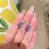 boucles d'oreilles avec cœur violet