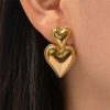 boucles d’oreilles avec double cœur