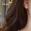 boucles d’oreilles avec puces cœur