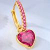 boucles d’oreilles clous cœur fuchsia