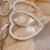 boucles d’oreilles gros cœur de marque