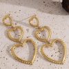 boucles d'oreilles pendantes 3 cœurs