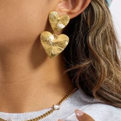 boucles d'oreilles pendantes avec 2 cœurs