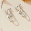 boucles d’oreilles pendantes avec cœur argent
