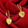 boucles d'oreilles pendantes avec cœur jaune
