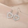 boucles d'oreilles pendantes cœur avec strass