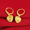 boucles d'oreilles pendantes cœur en jaune