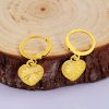 boucles d'oreilles pendantes cœur jaune