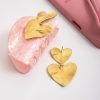boucles d'oreilles pendantes plus 2 cœurs
