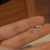 boucles d’oreilles puces cœur de marque