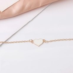 bracelet avec cœur blanc