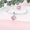charm avec cœur fleuri