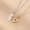 collier avec cœur aimanté