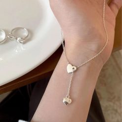collier avec cœur argenté